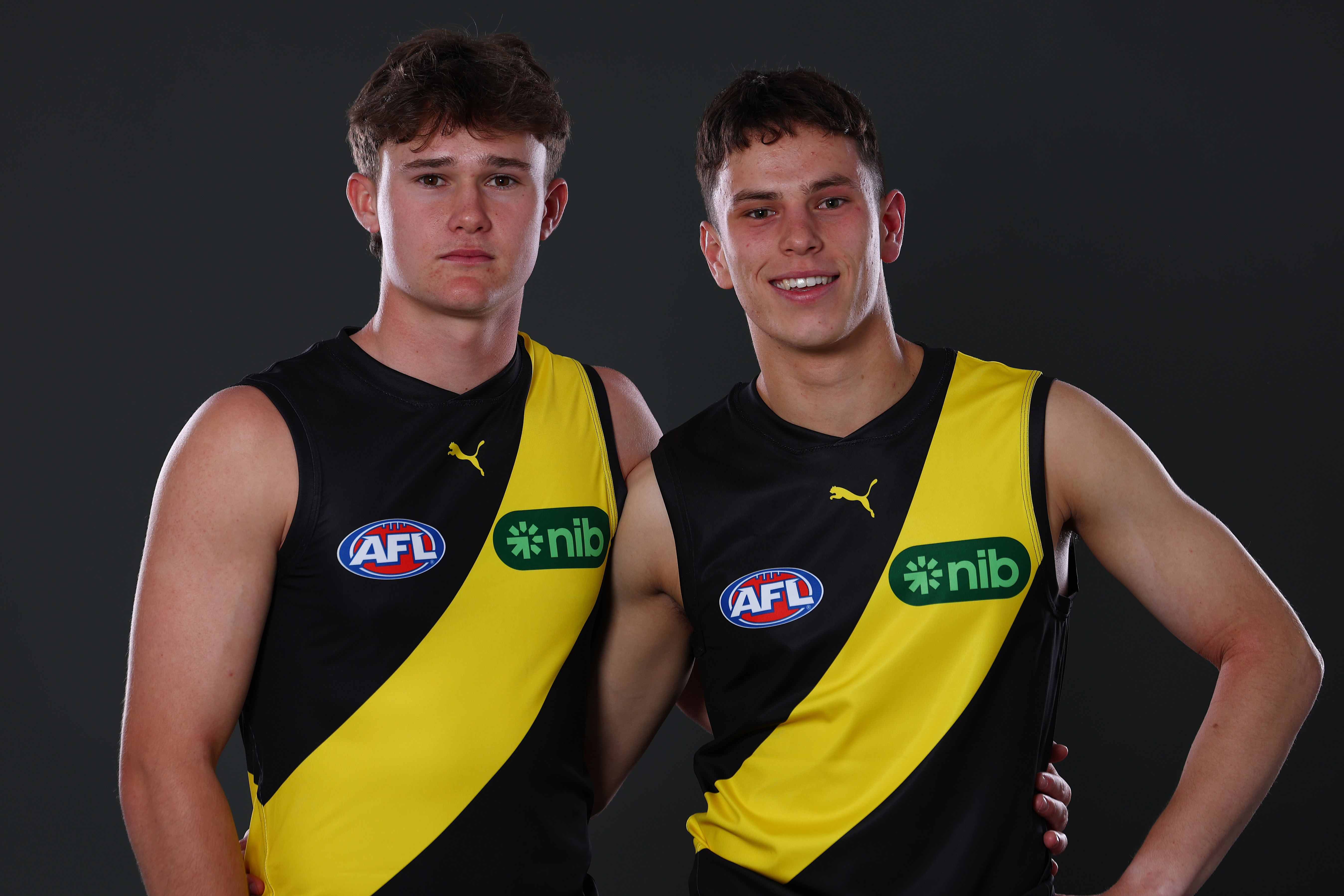 Sam Cumming and Samuel Grlj pose after being selected by the Tigers as part of the 2025 AFL Draft.