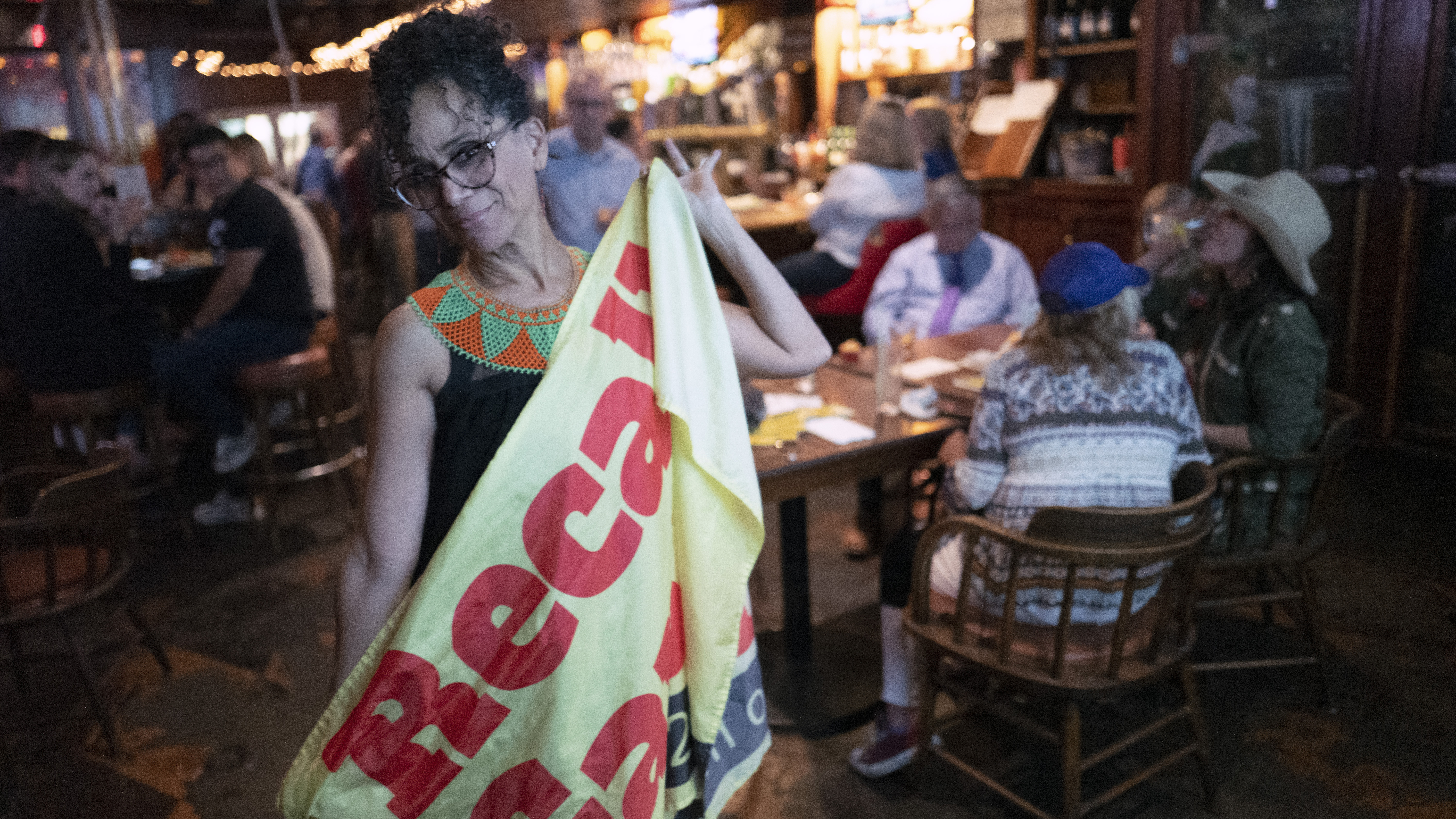 Recall proponent, Roxanne Hoge held up a recall Gavin Newsom flag at an election party in Los Angeles.