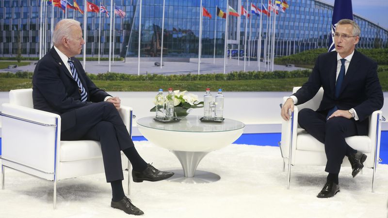 NATO Secretary General Jens Stoltenberg speaks with US President Joe Biden during a bilateral meeting on the sidelines of a NATO summit at NATO headquarters in Brussels. 