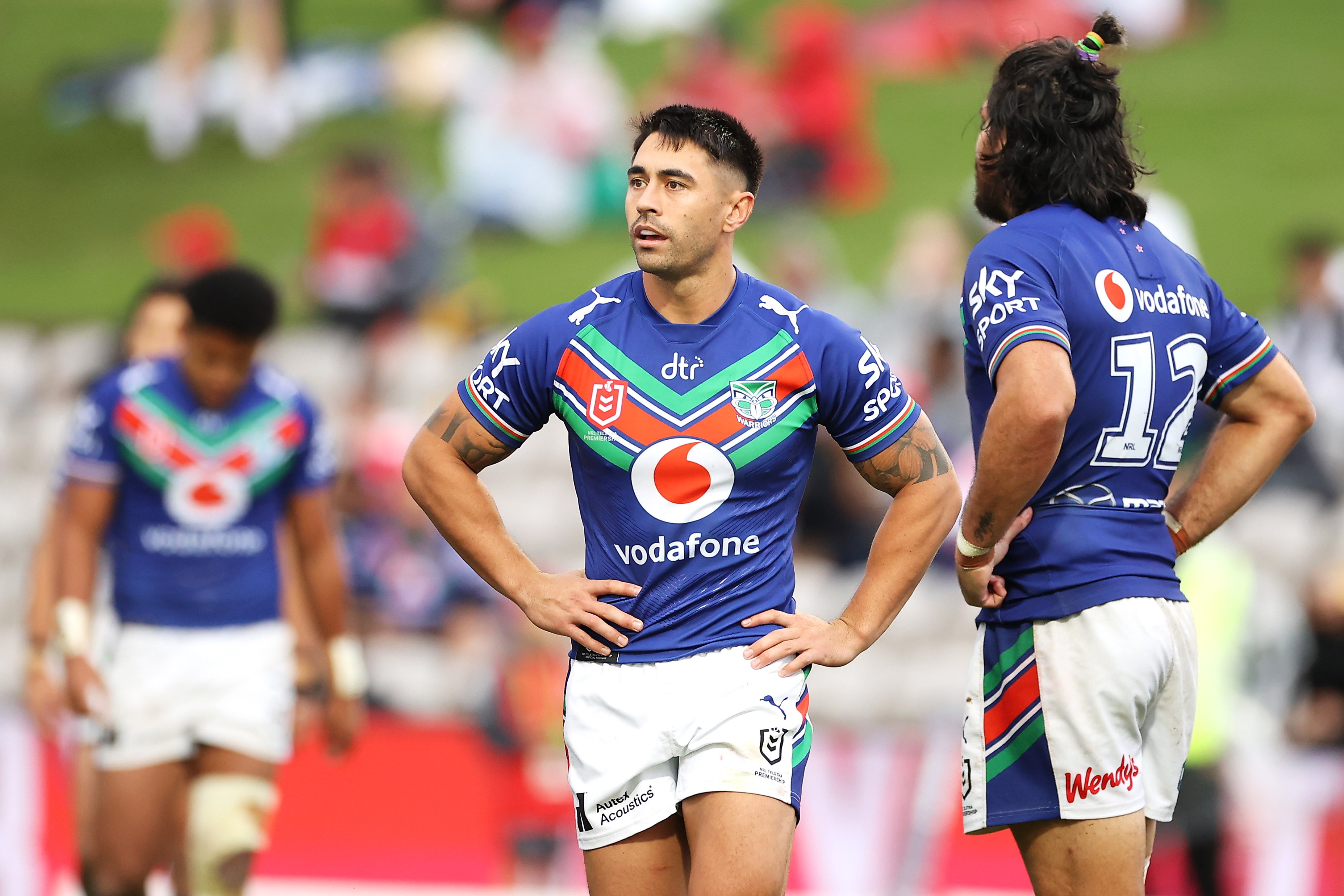 Tonga's Will Penisini (left) and Cook Islands' Kayal Iro in action