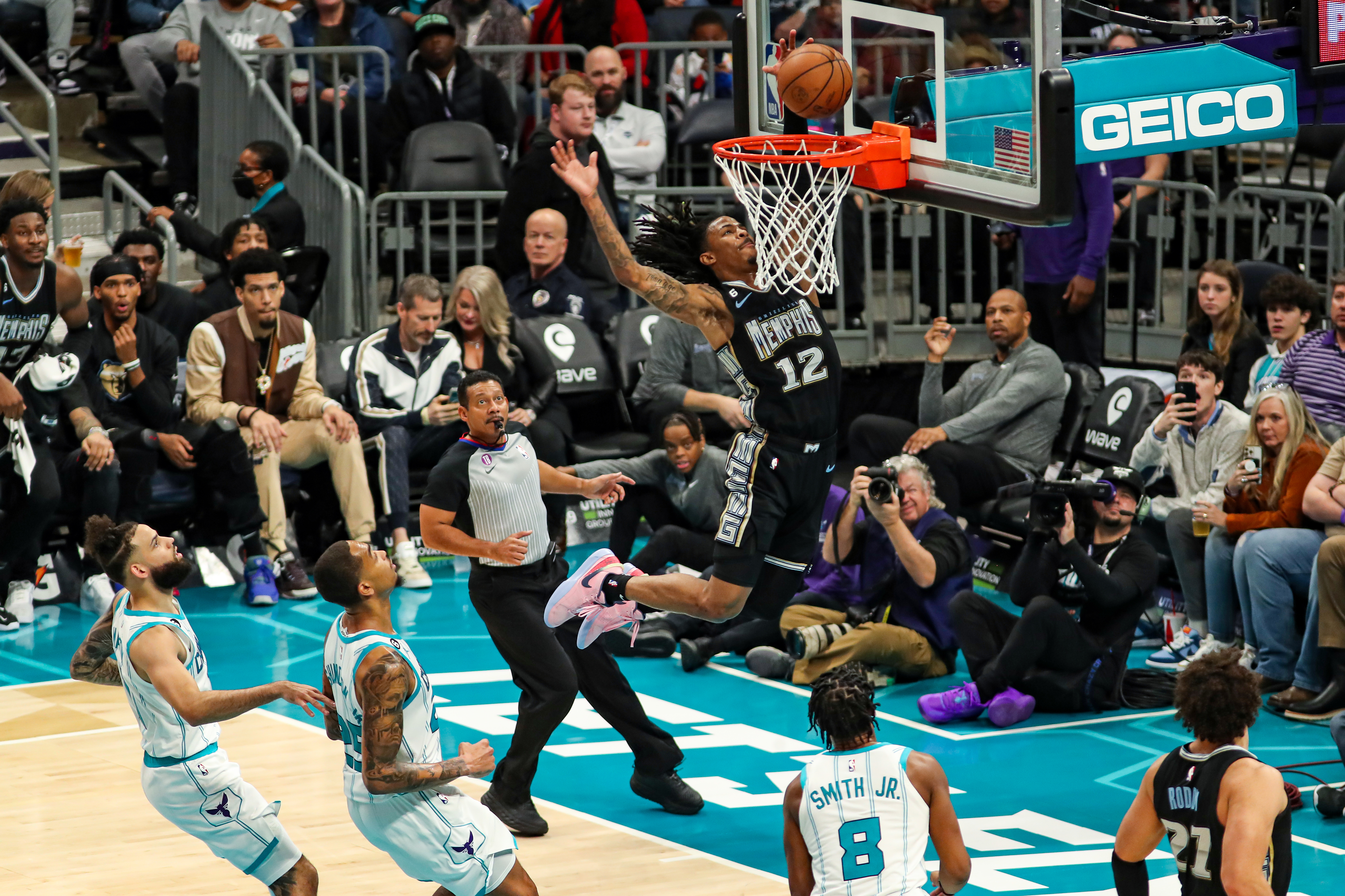 Ja Morant #12 of the Memphis Grizzlies drives to the basket during the game against the Charlotte Hornets on January 4, 2023 at Spectrum Center in Charlotte, North Carolina. (Photo by Brock Williams-Smith/NBAE via Getty Images)