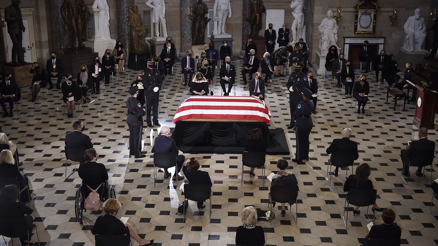 A US Capitol Police honour guard surrounds the flag-draped casket of Justice Ruth Bader Ginsburg as lies in state in Statuary Hall of the US Capitol, Friday, Sept. 25, 2020 in Washington.