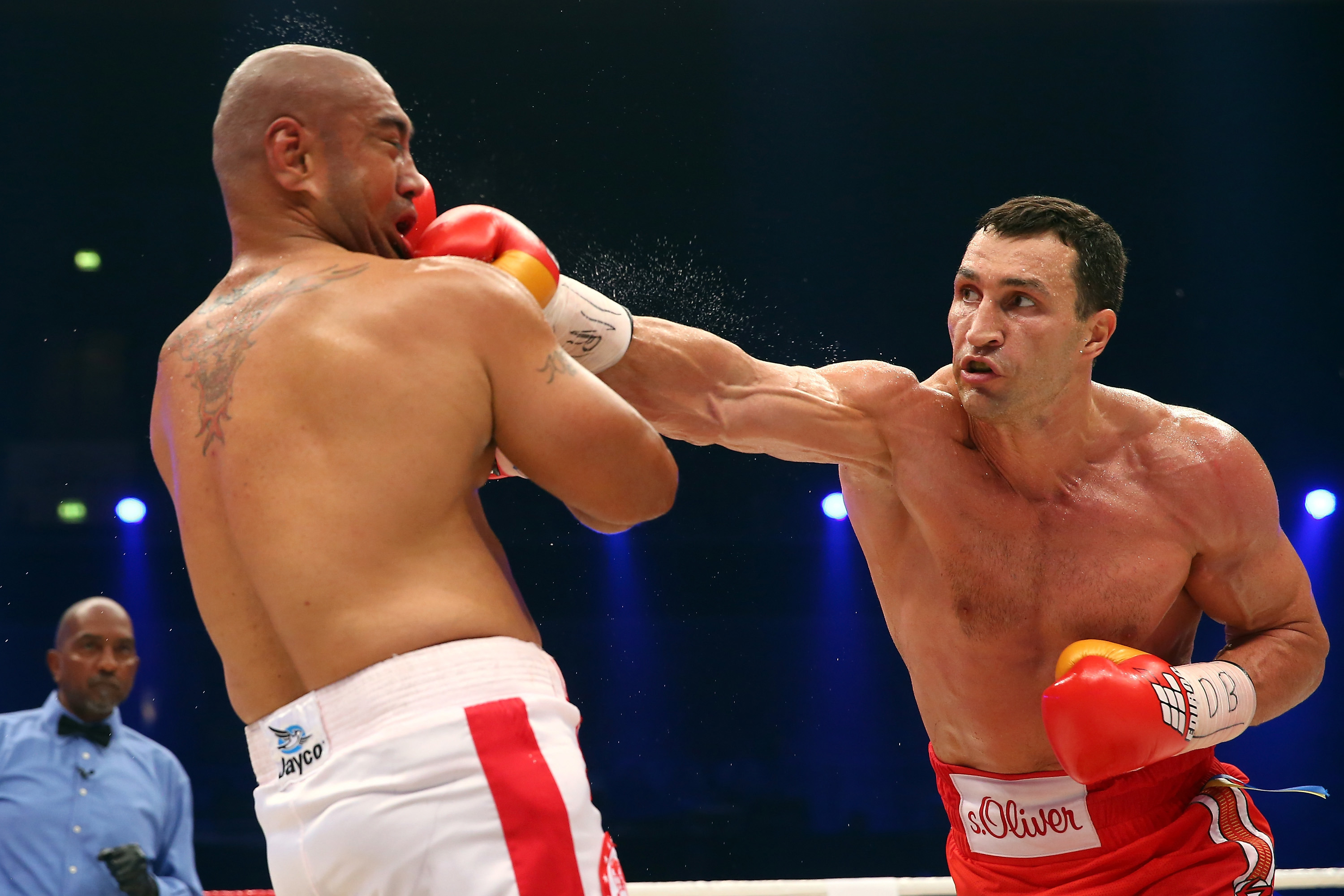 Wladimir Klitschko of Ukraine punches Alex Leapai of Australia.