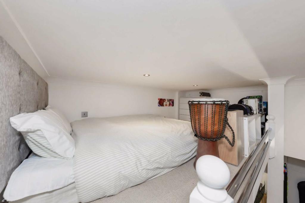 London studio flat is so small that you can't even stand up in the bedroom.