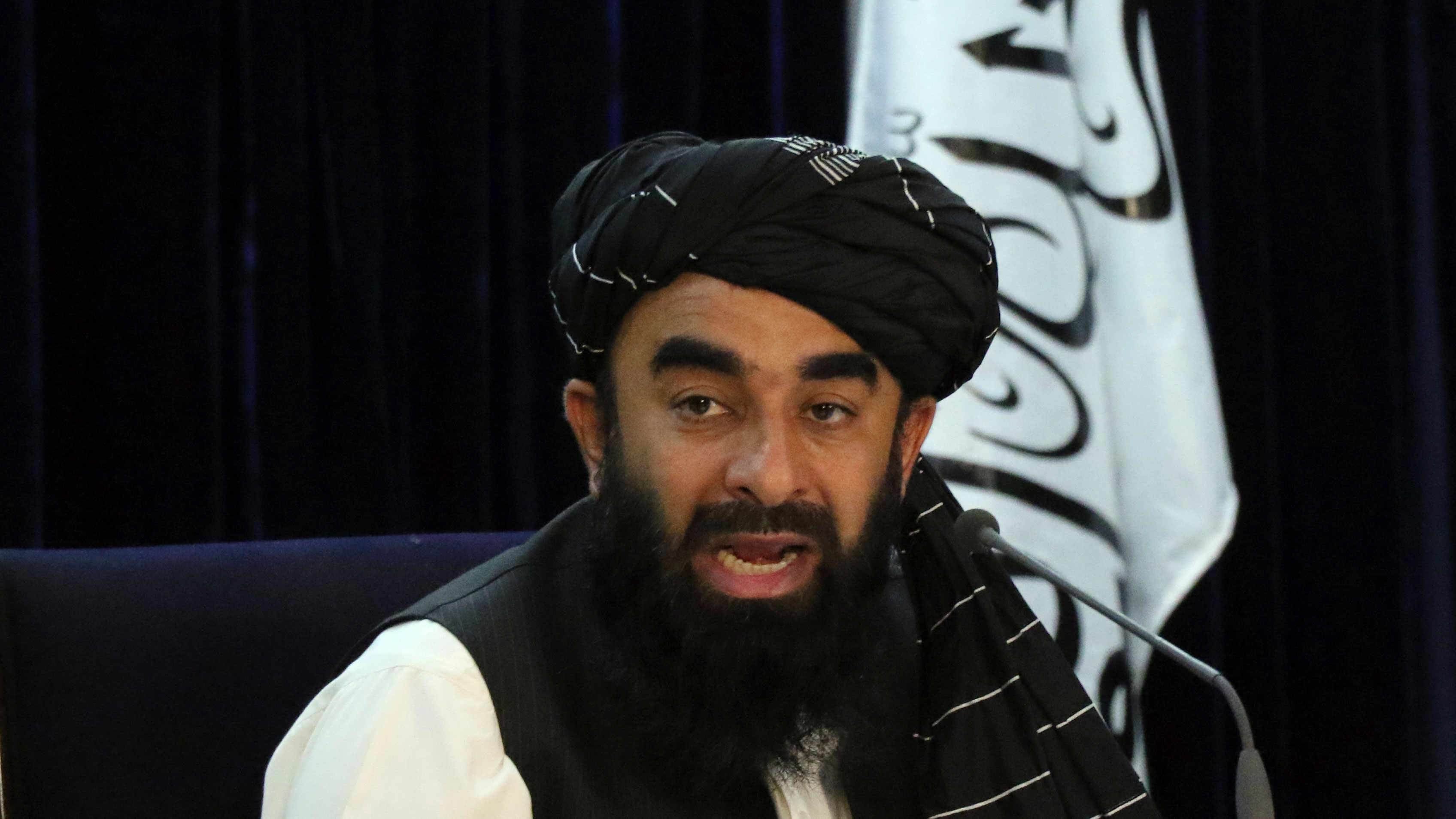 Taliban spokesman Zabihullah Mujahid speaks during a press conference in Kabul. The Taliban have announced a caretaker Cabinet stacked with veterans of their harsh rule in the late 1990s.