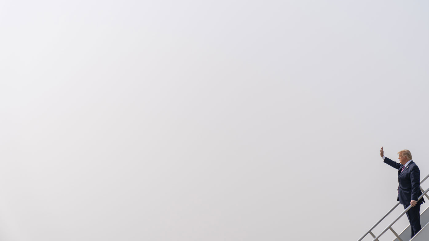 Donald Trump arrives in a smoke-strewn Sacramento.