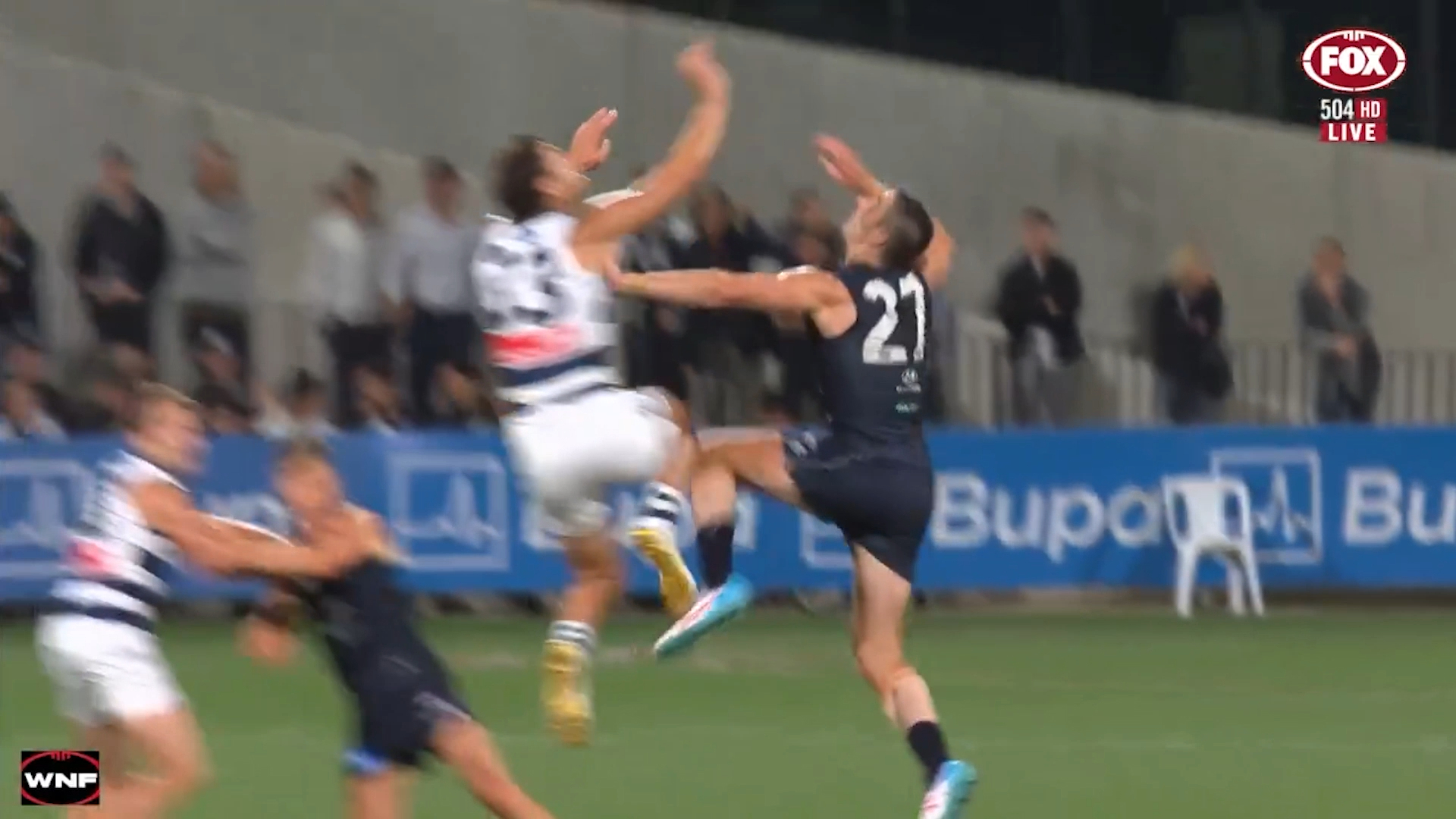 Shannon Neale and Marc Pittonet make knee on knee contact.