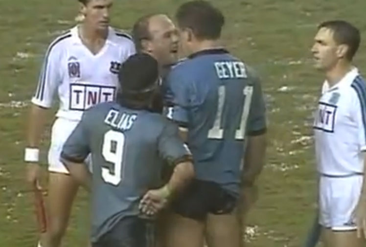 Wally Lewis and Mark Geyer famously lock horns in Game II,  1991.