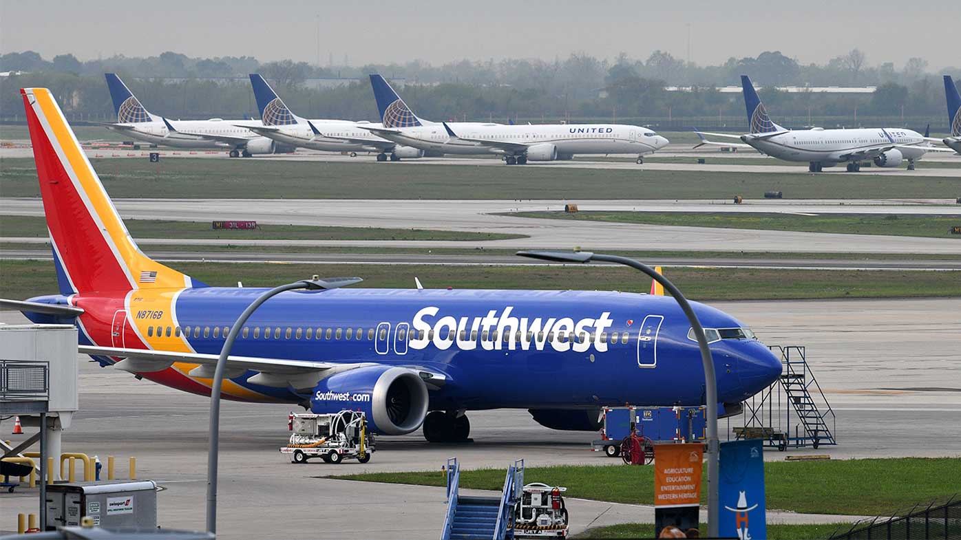 The pilot of a Southwest Airlines flight threatened to cancel takeoff after someone on the plane sent a naked photograph to other passengers.