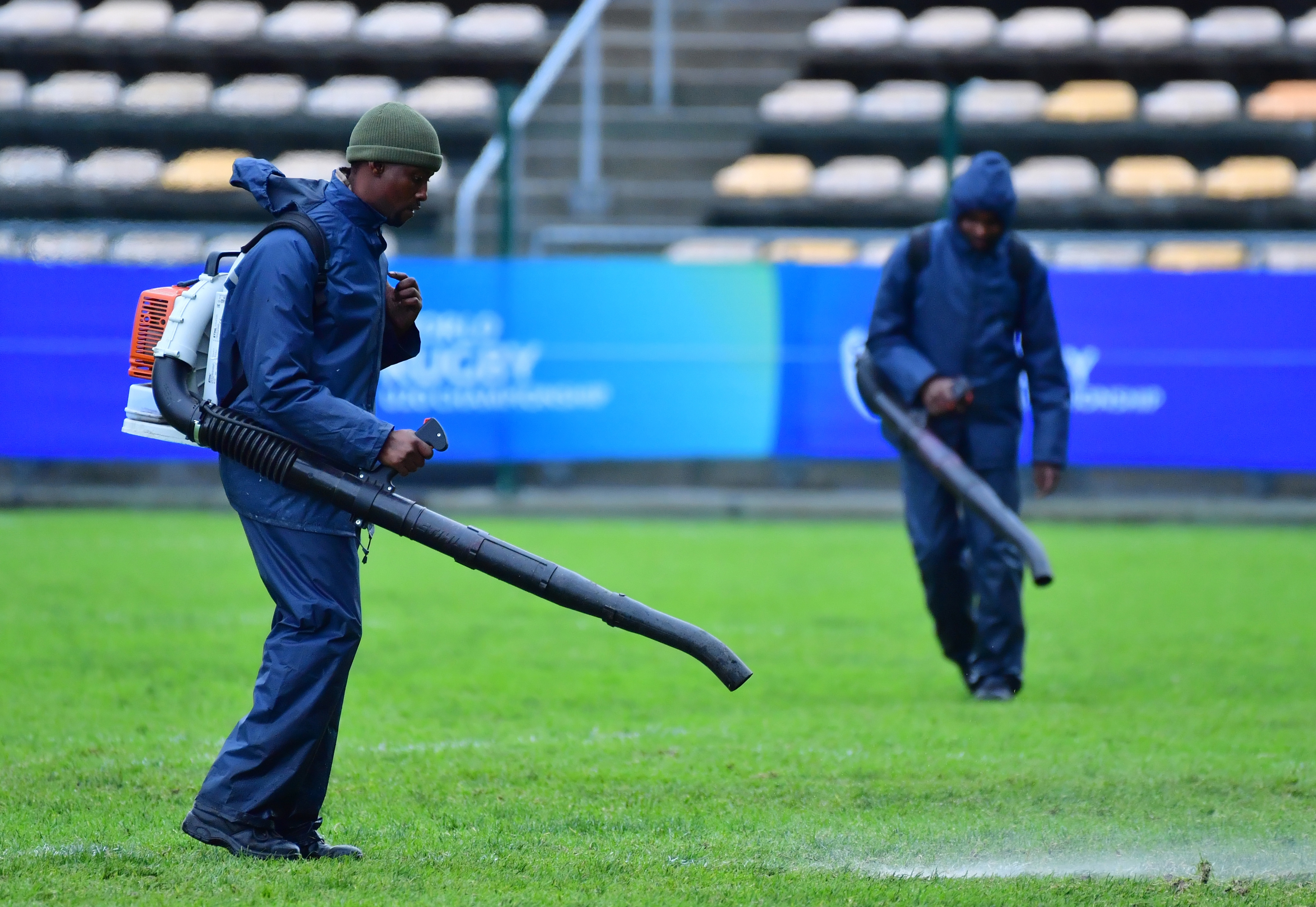 Groundsmen work to prepare the field at Athlone Stadium.