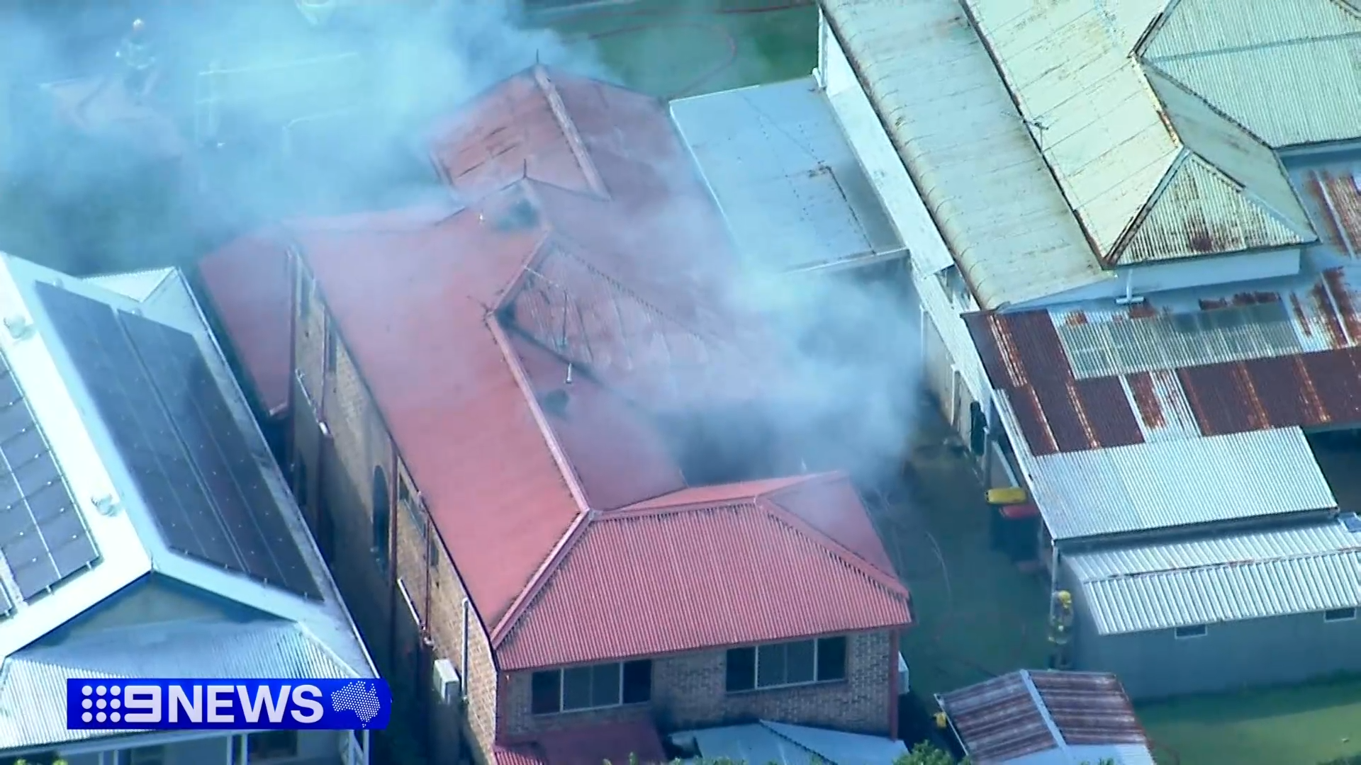 The family that lives at the home were already outside when the fire broke out on the balcony.