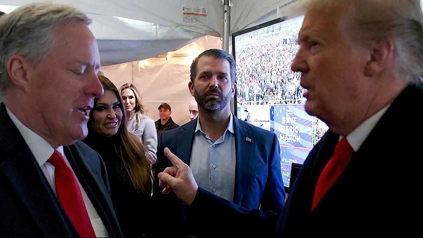 President Donald Trump talking to his chief of staff Mark Meadows before Trump spoke at the rally on the Ellipse on January 6.