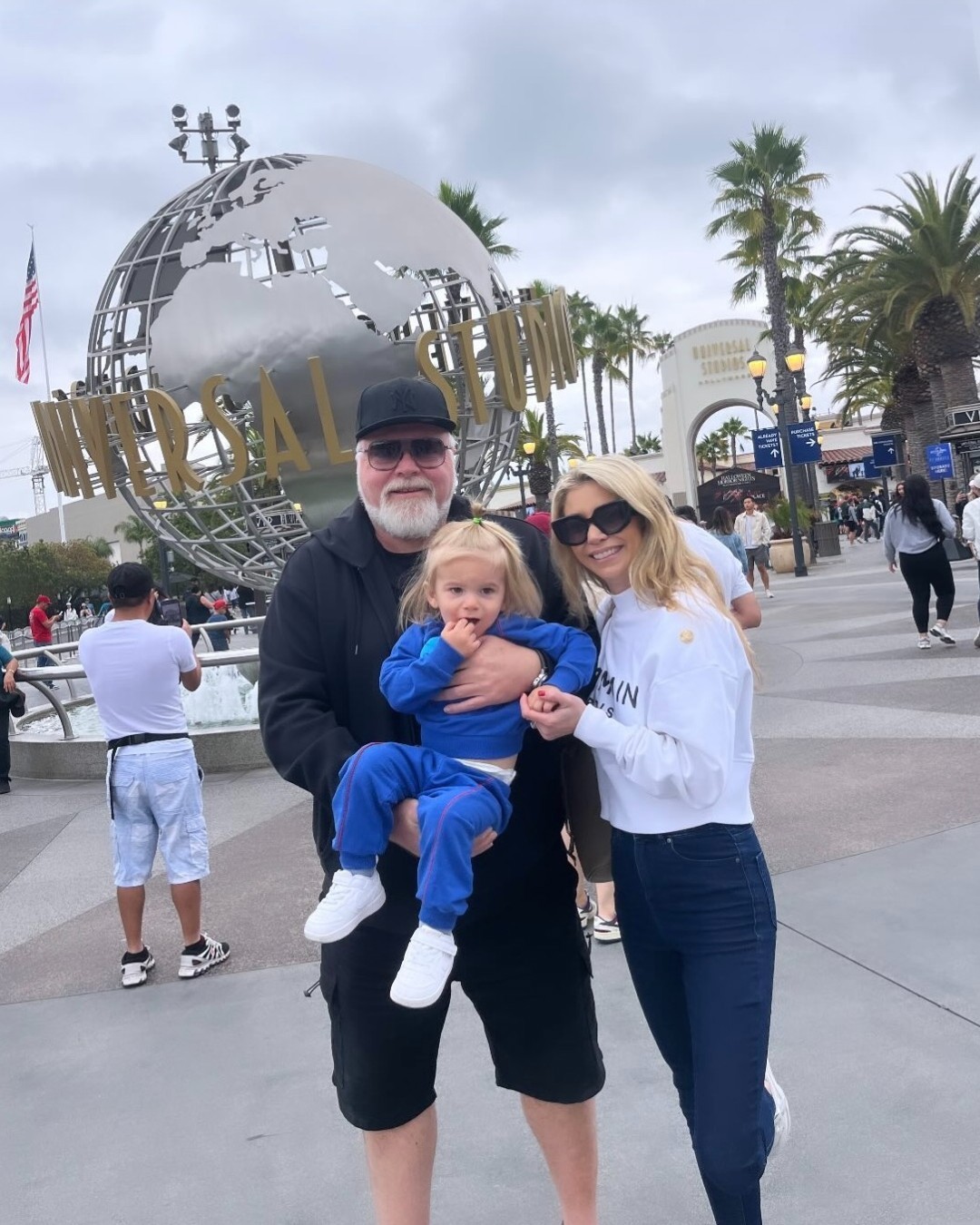 Kyle Sandilands, Tegan Kynaston and son Otto in the US