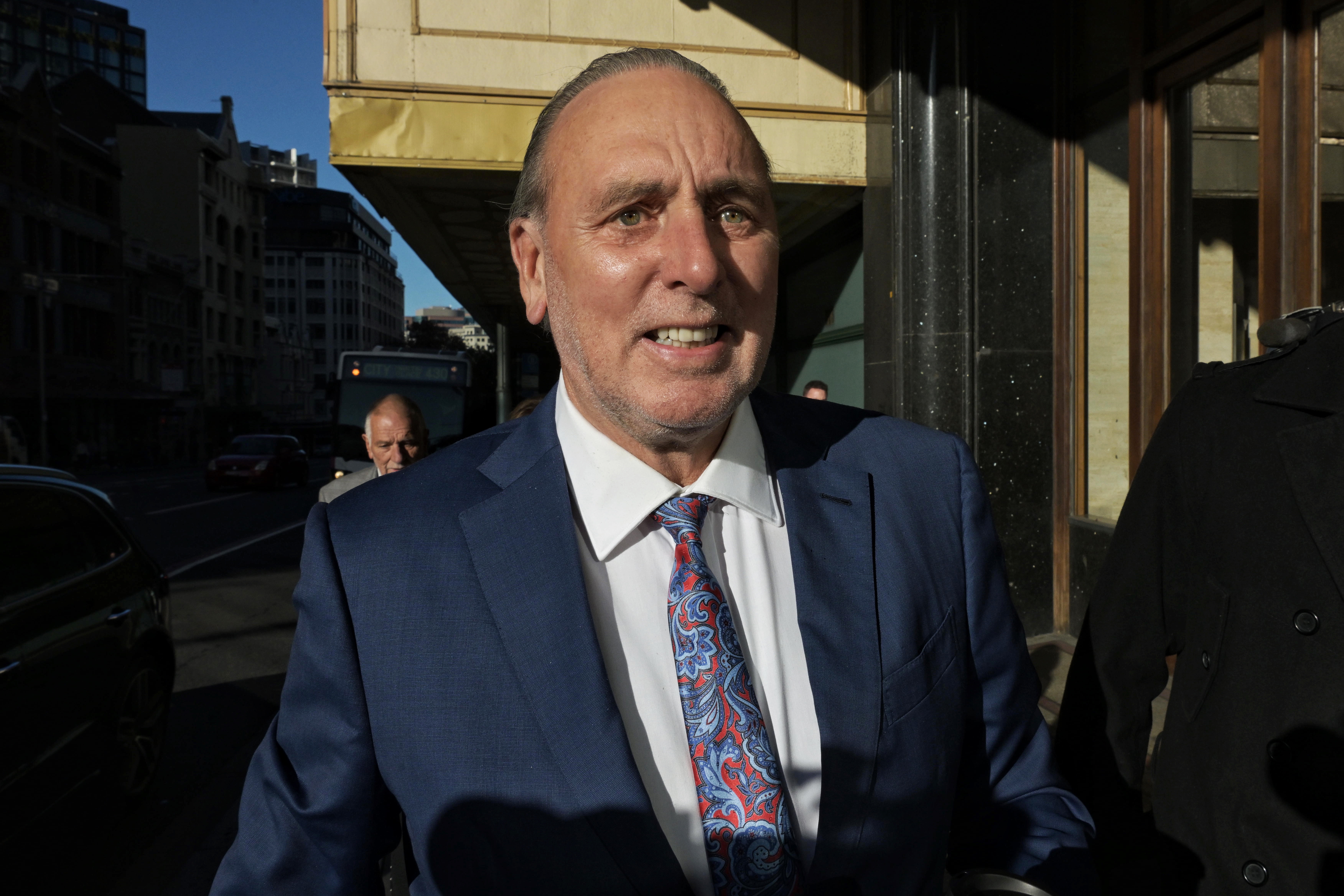 Brian Houston enters Downing Centre courts Photo Nick Moir 15 June 2023