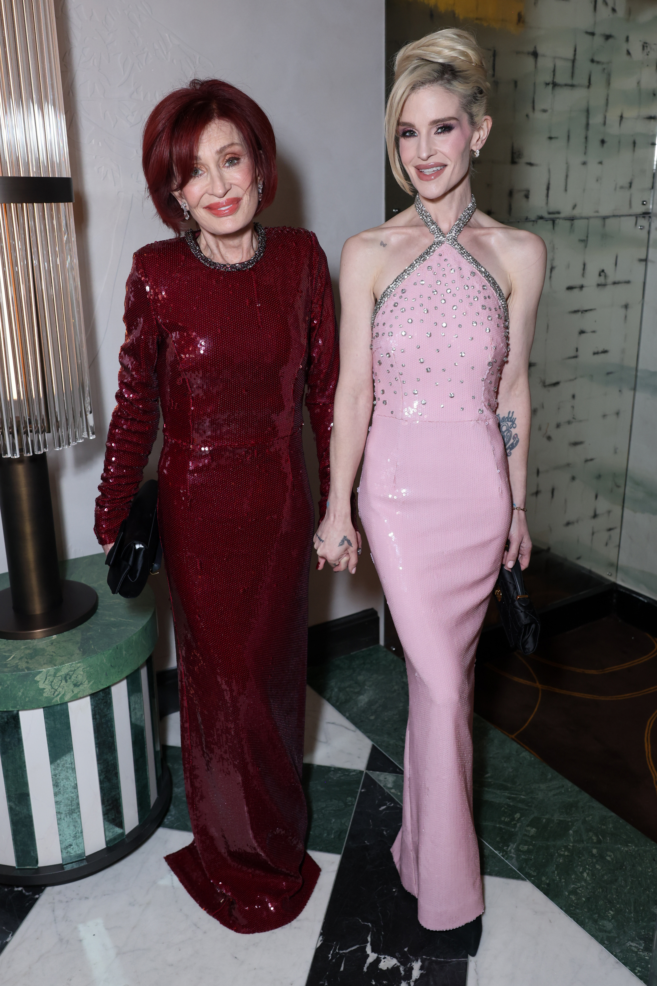 LONDON, ENGLAND - NOVEMBER 26: Sharon Osbourne and Kelly Osbourne attend a special cocktail hosted by Rebecca Vallance at Aki London on November 26, 2025 in London, England. (Photo by Max Cisotti/Dave Benett/Getty Images for Rebecca Vallance)