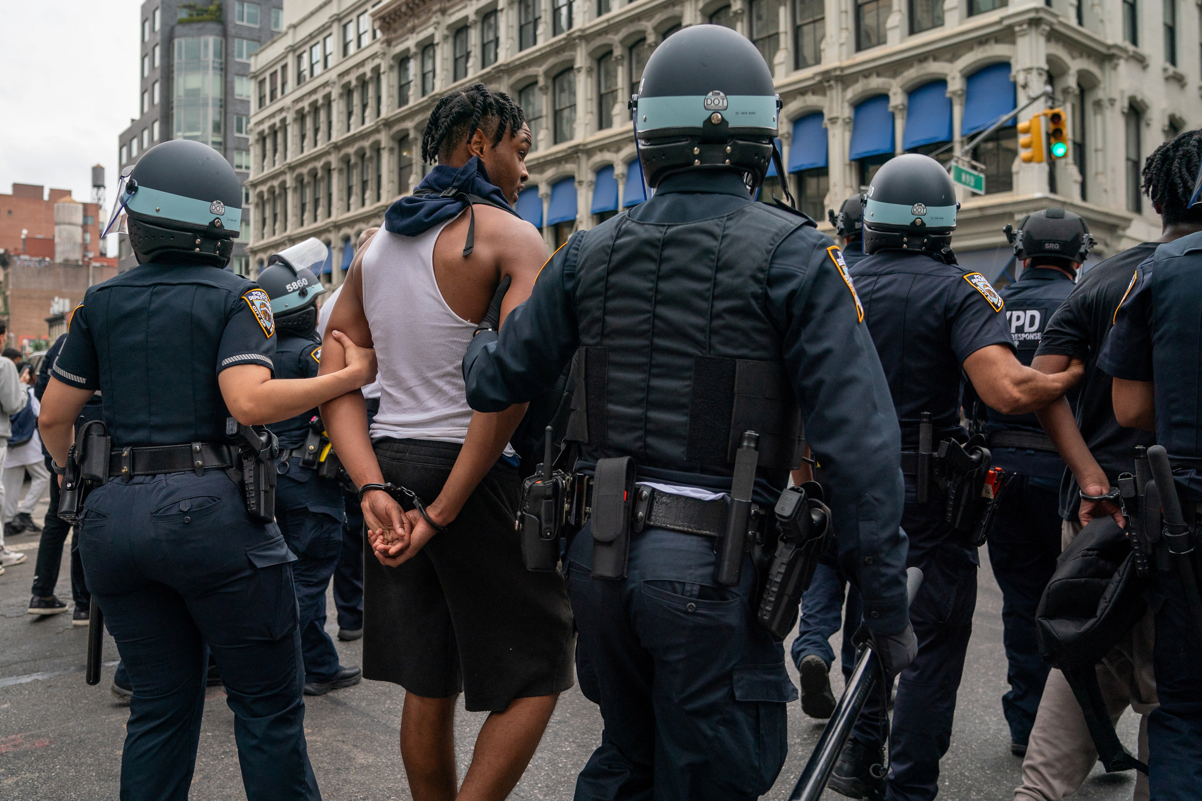 Police officers detain a person after popular live streamer Kai Cenat announced a "giveaway" event that grew chaotic, prompting police officers to respond and disperse the crowd at Union Square and the surrounding streets, in New York City, U.S. August 4, 2023. REUTERS/David 'Dee' Delgado