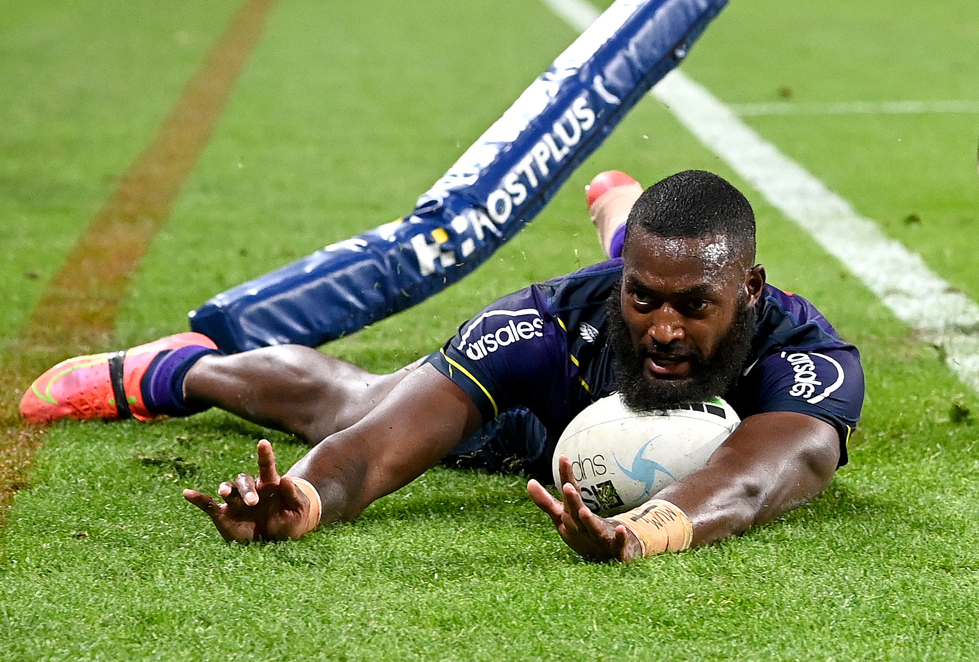 BRISBANE, AUSTRALIA - AUGUST 28: Isaac Lumelume of the Storm scores a try during the round 24 NRL match between the Melbourne Storm and the Parramatta Eels at Suncorp Stadium, on August 28, 2021, in Brisbane, Australia. (Photo by Bradley Kanaris/Getty Images)