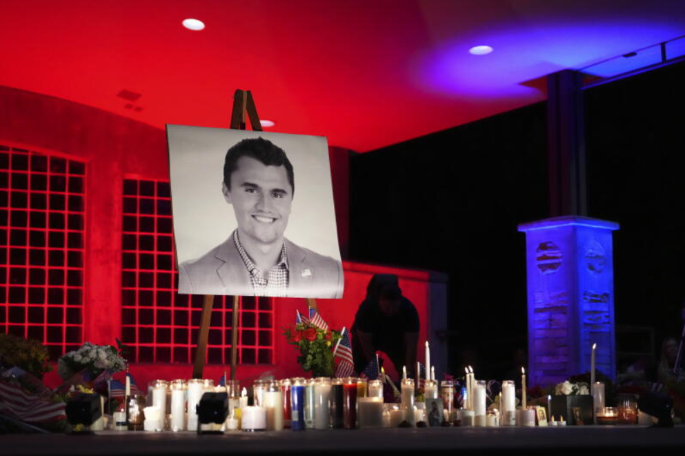 Utah Valley University students Zach Zimmerman, second from left, and Lauren Simons embrace during a vigil for Charlie Kirk, the CEO and co-founder of Turning Point USA who was shot and killed, Thursday, Sept. 11, 2025, in Orem, Utah. Zimmerman witnessed the shooting. 