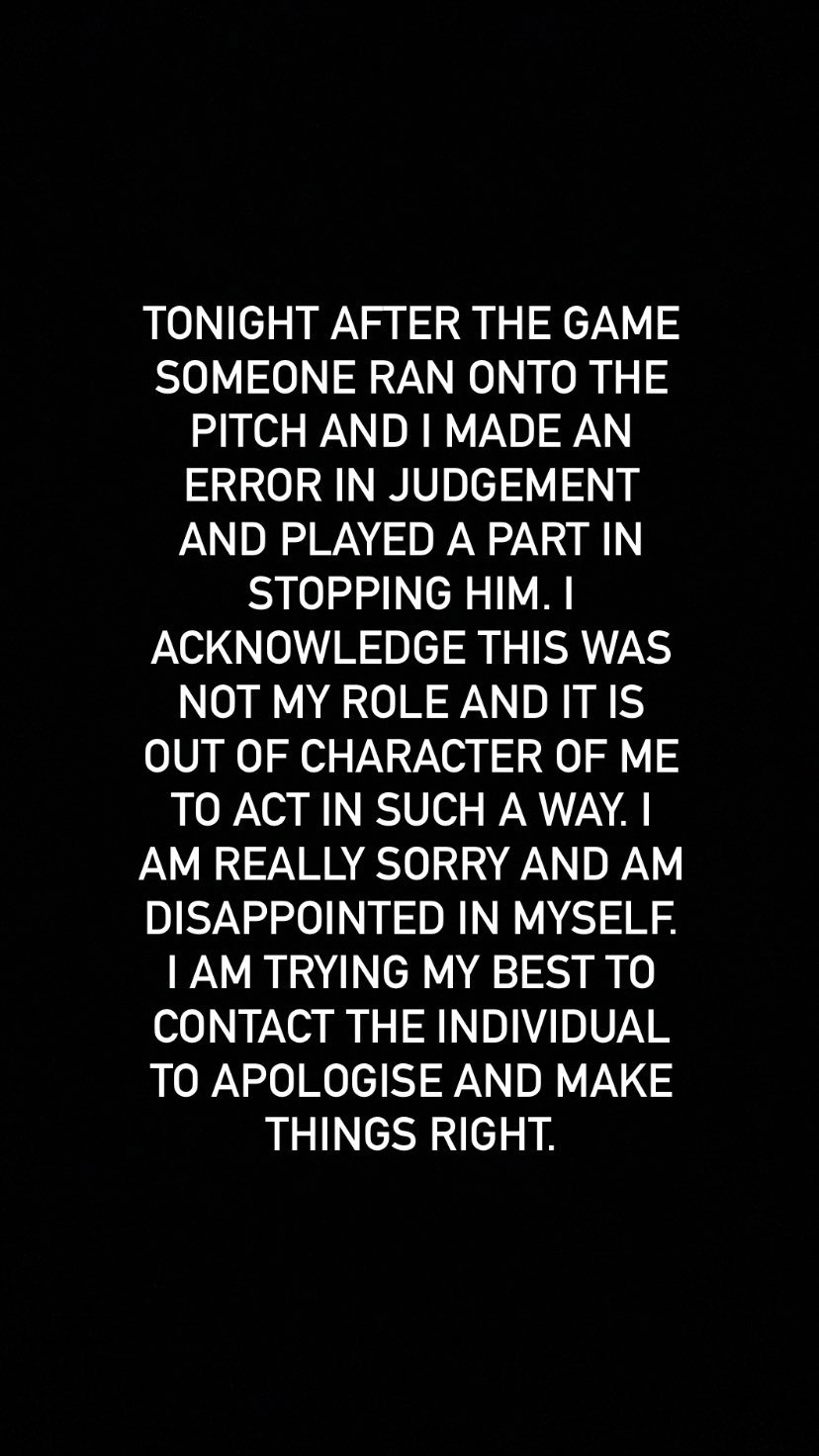Sam Cane apologises for tripping a pitch invader during the All Blacks' test match against Argentina test in Mendoza on July 8 2023.