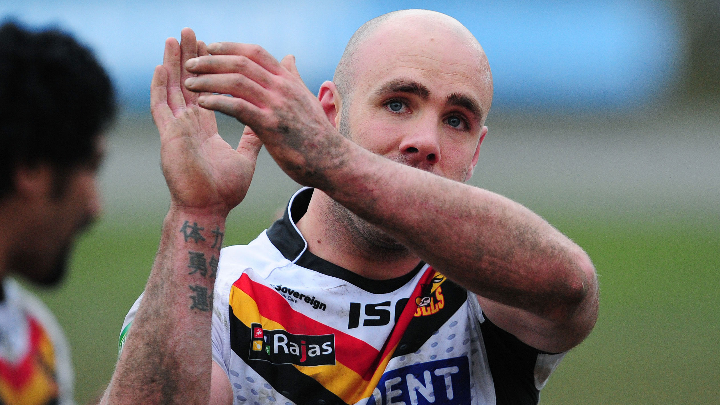 Adrian Purtell aplauds the crowd after a game for the Bradford Bulls.