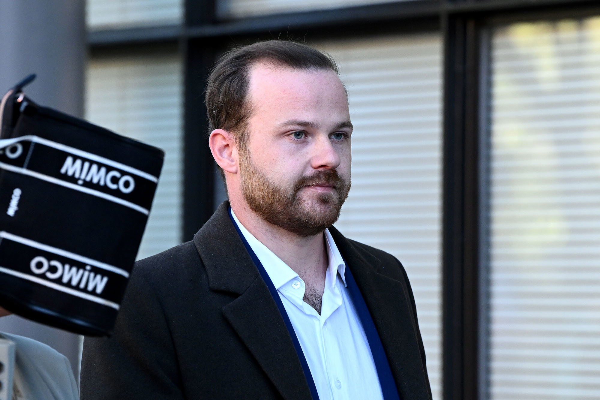 Joshua Fisher departs the Burwood Local Court in Sydney, Monday, July 1, 2024. 