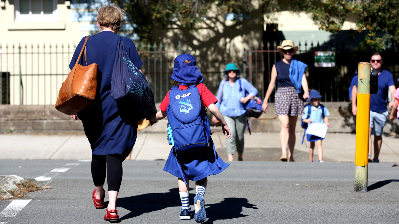 A mother and her child outside Annandale Public School in Sydney's Inner West