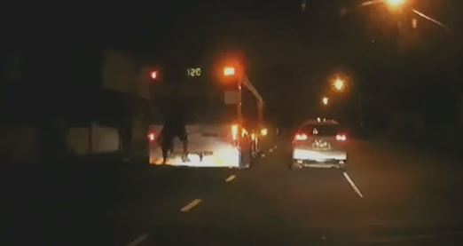 Two teens have been caught holding onto the back of a Brisbane bus. 
