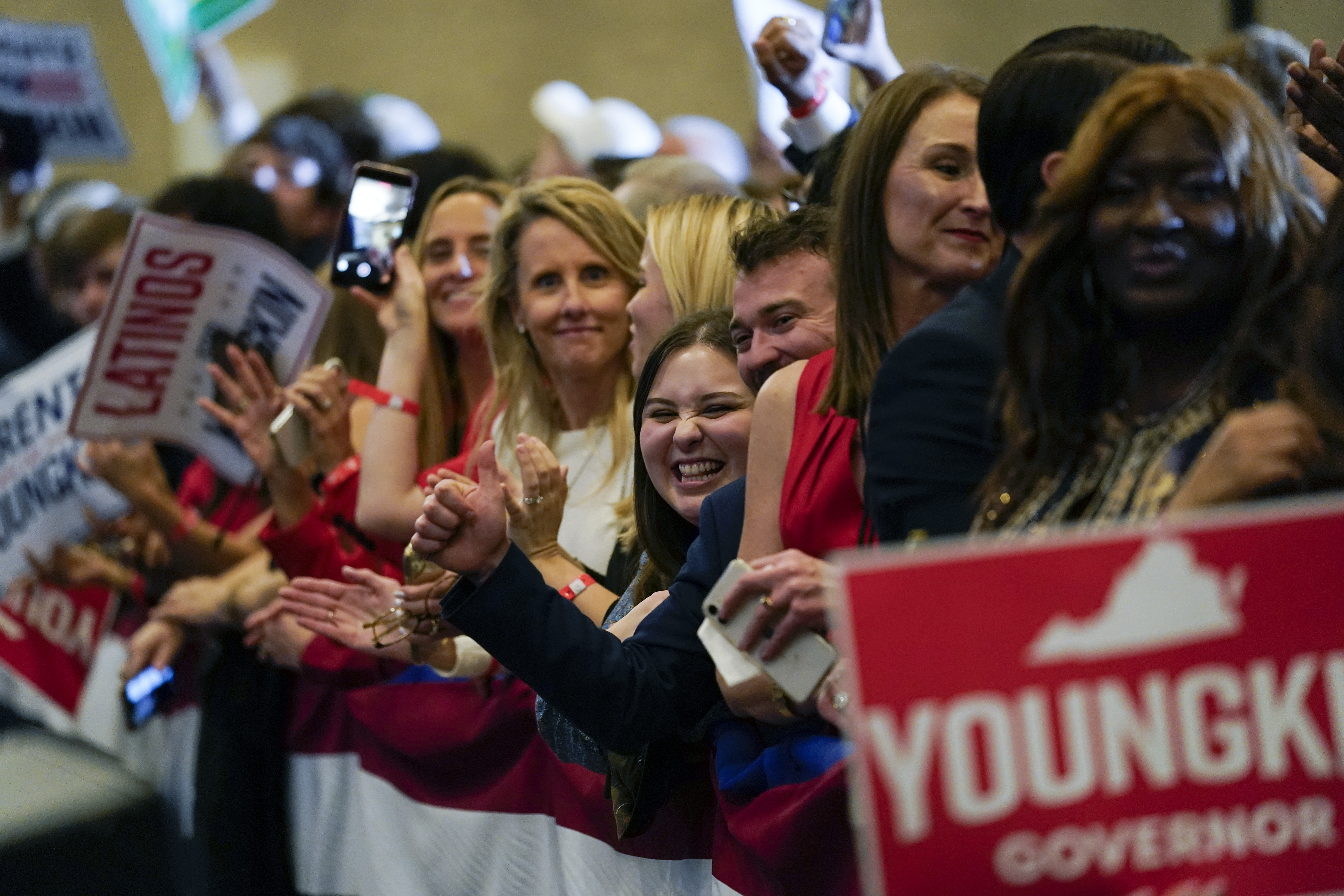 Supporters of Republican gubernatorial candidate Glenn Youngkin gather for an election night party. 