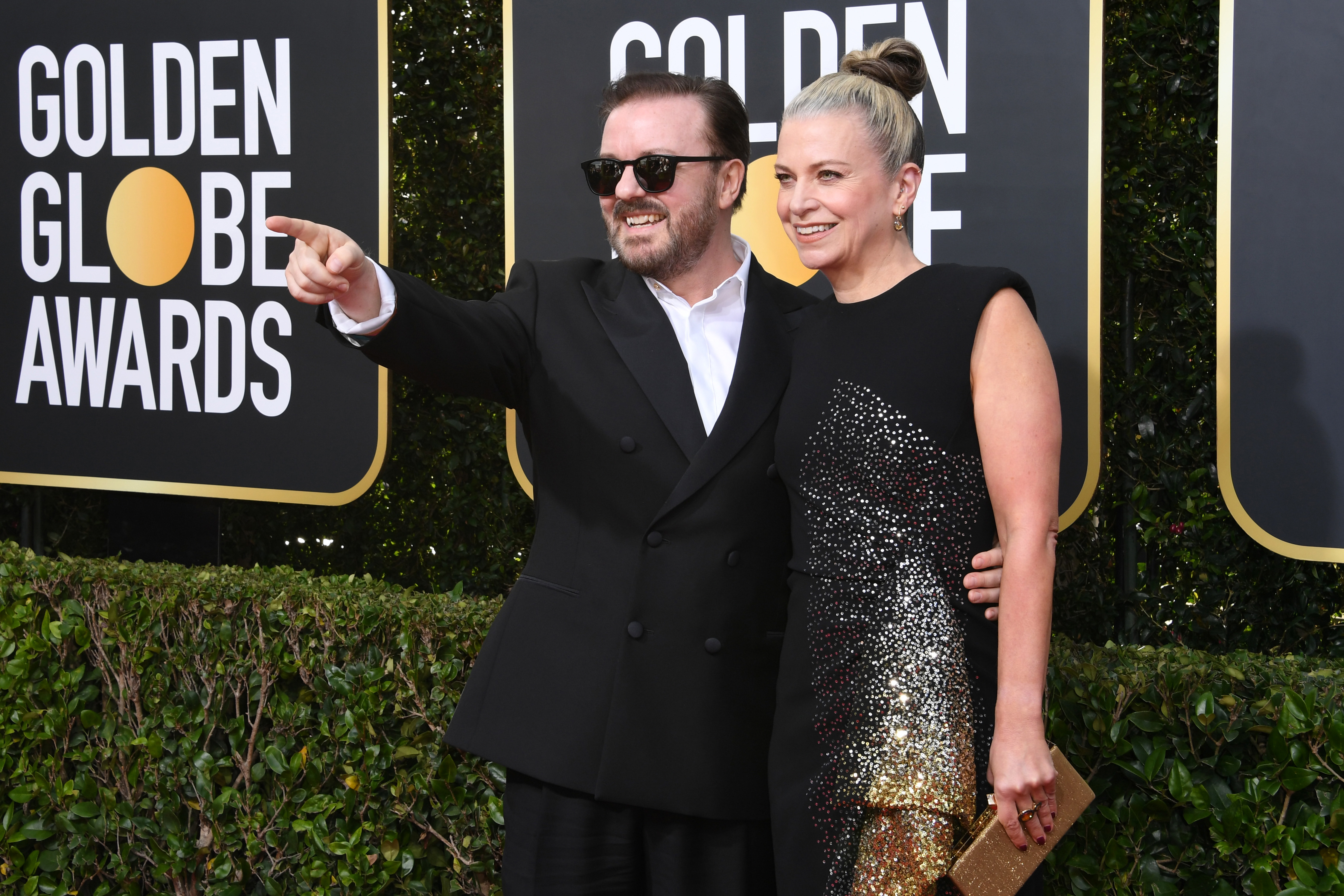Ricky Gervais and Jane Fallon arrive at the 2020 Golden Globe Awards.