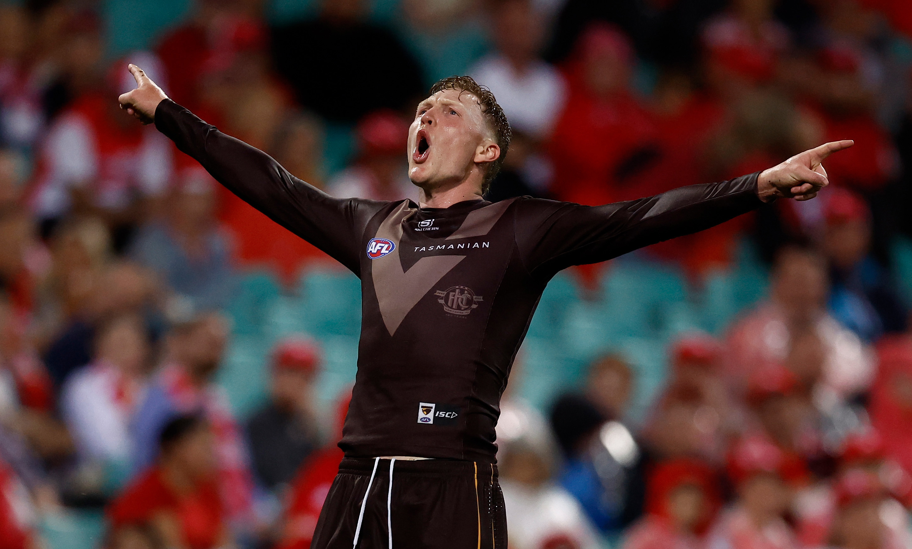 James Sicily celebrates a goal against the Sydney Swans.