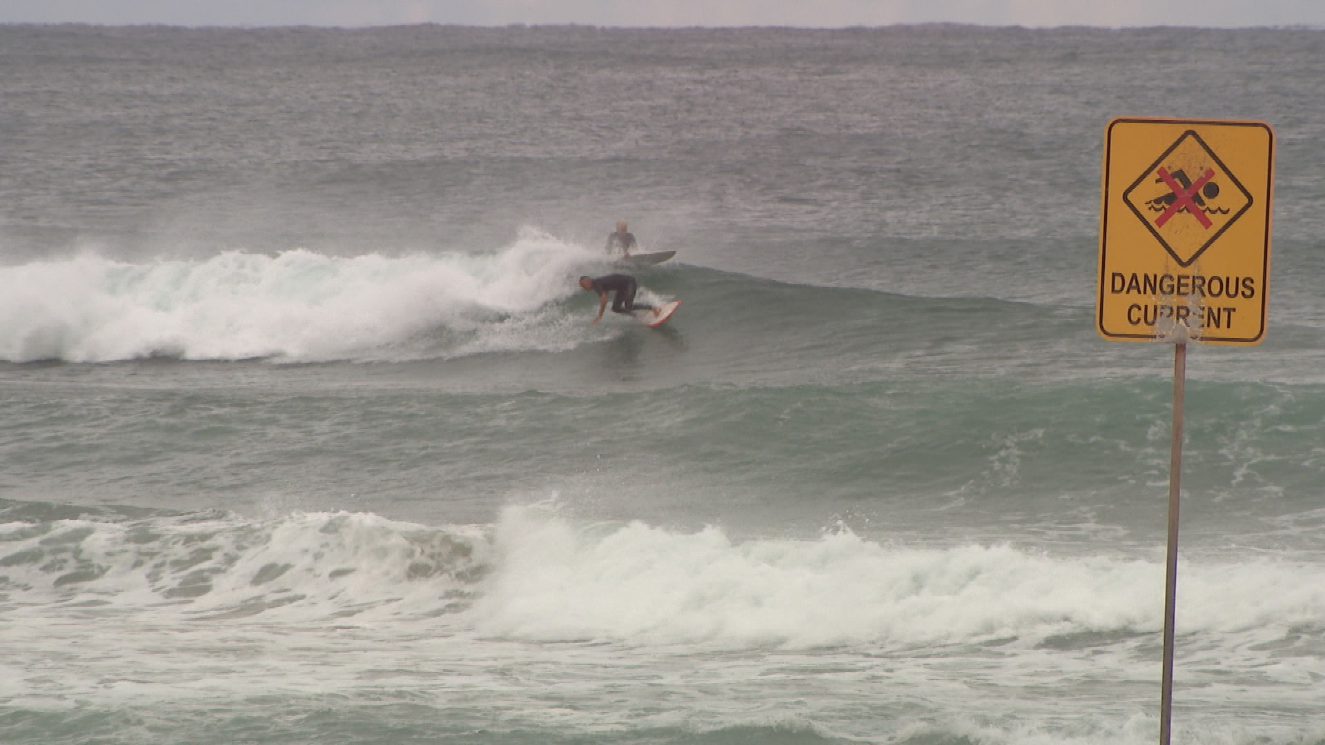 Hazardous surf warning in place as NSW coast hit with 11-metre swell