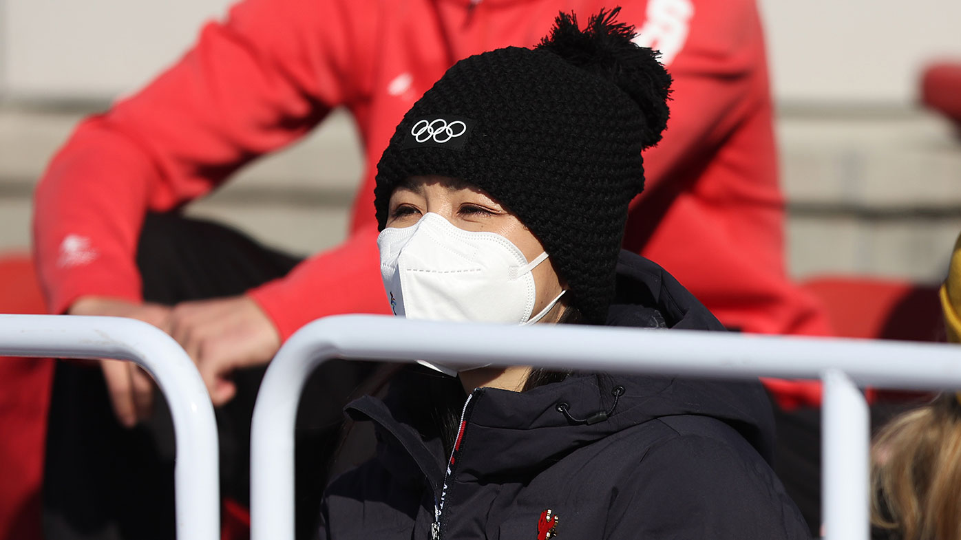 Chinese tennis player Peng Shuai looks on during the Women's Freestyle Skiing