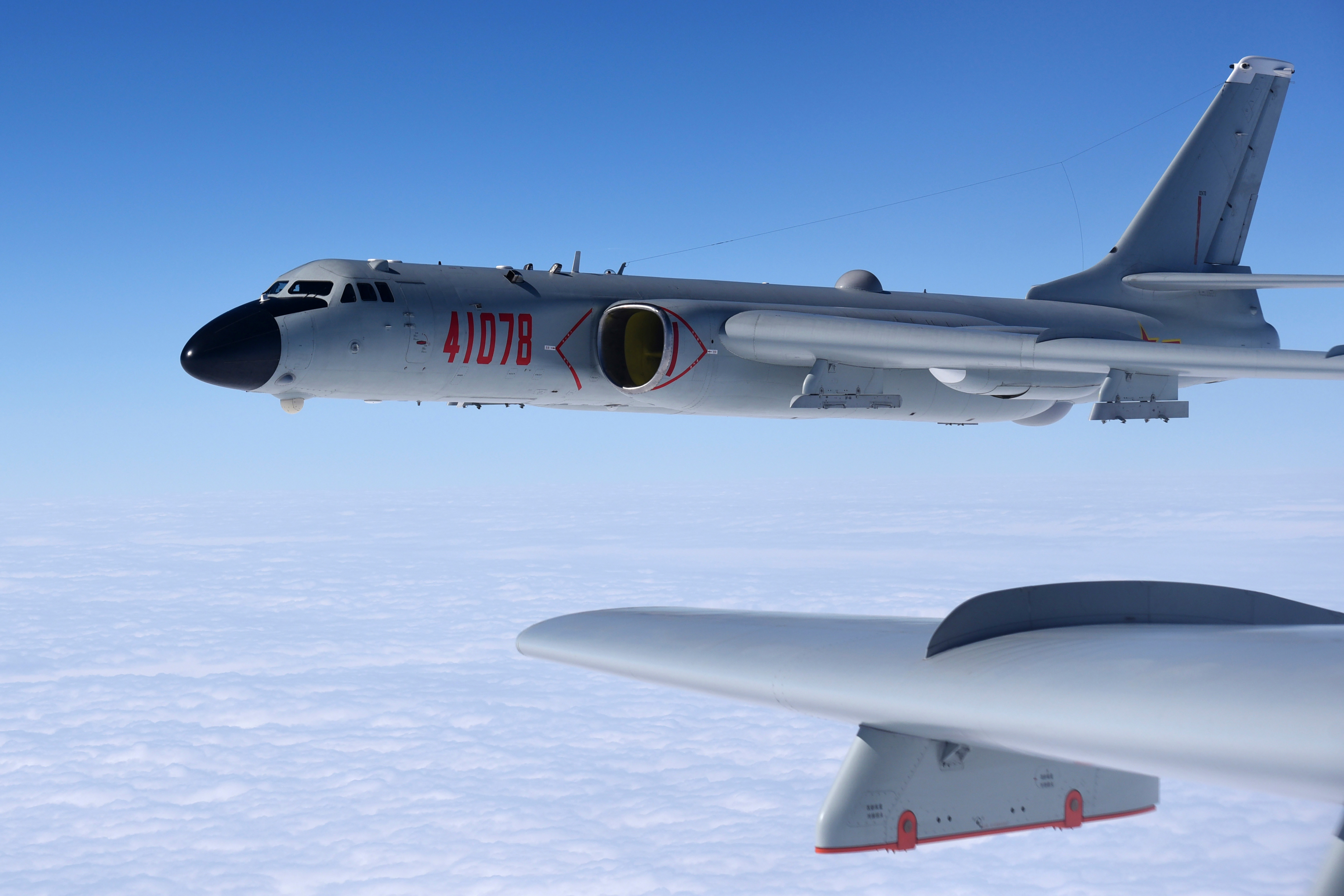A Chinese military H-6K bomber conducts a training exercises above the South China Sea.