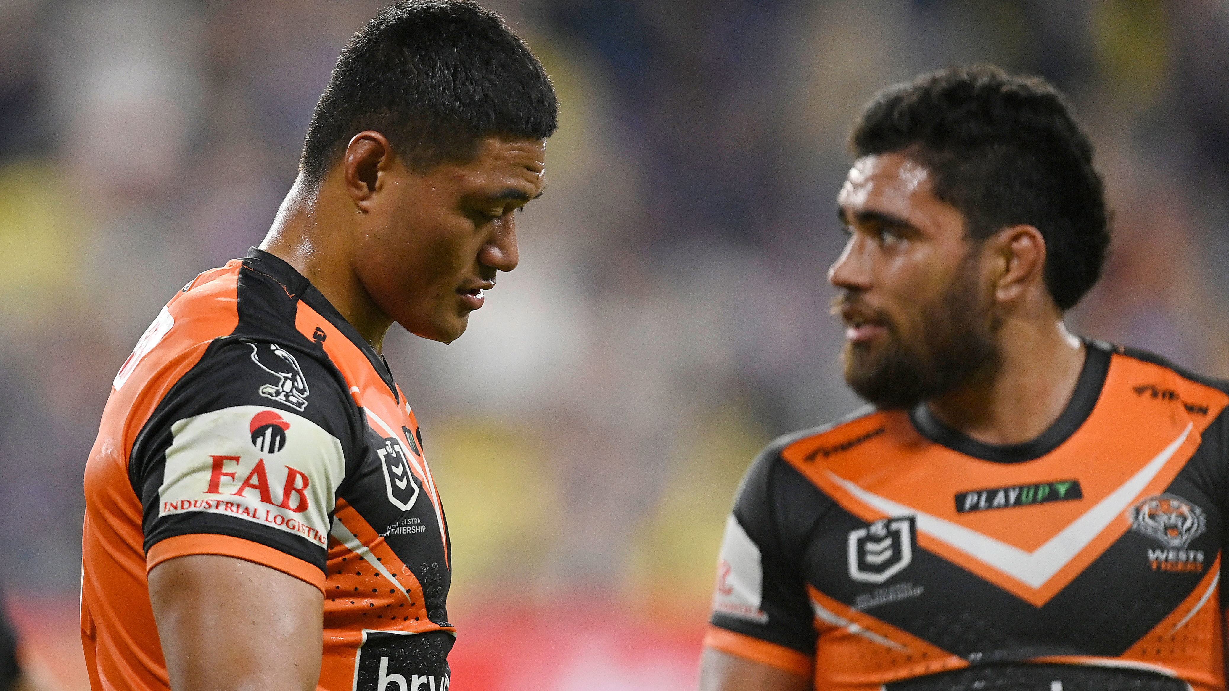 Stefano Utoikamanu of the Tigers looks dejected as he walks from the field after losing the round 18 match against the Cowboys.