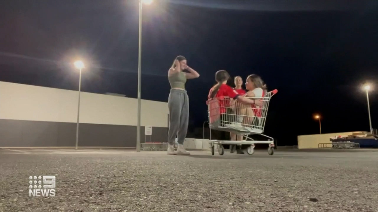 Two teenage girls got stuck in a shopping trolley after a TikTok filming session went wrong.