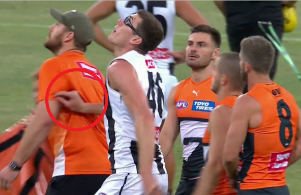 Mason Cox shoved Giants ruck coach Shane Mumford in strange pre match scenes.