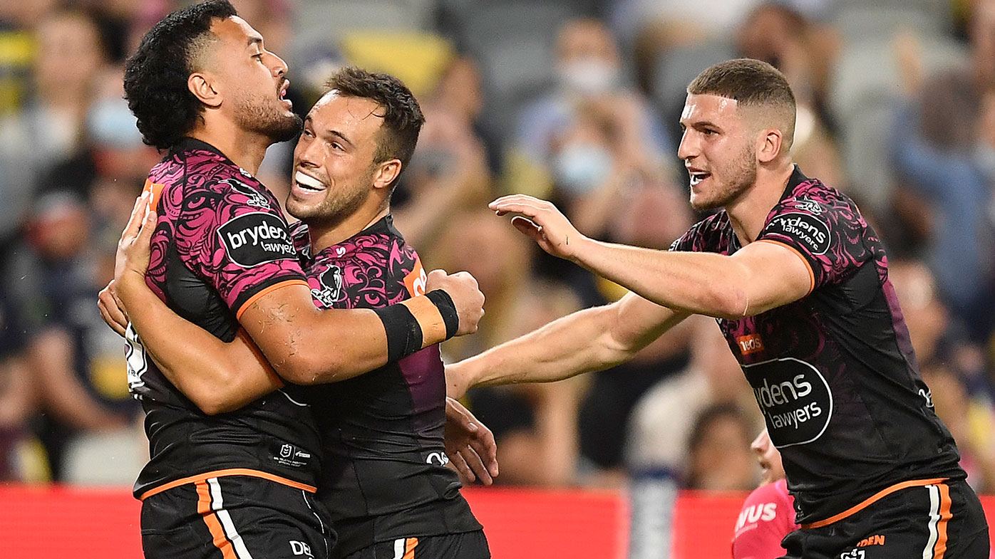 : Kelma Tuilagi of the Tigers celebrates after scoring a try during the round 22 NRL match between the North Queensland Cowboys and the Wests Tigers at QCB Stadium, on August 14, 2021, in Townsville, Australia. (Photo by Ian Hitchcock/Getty Images)