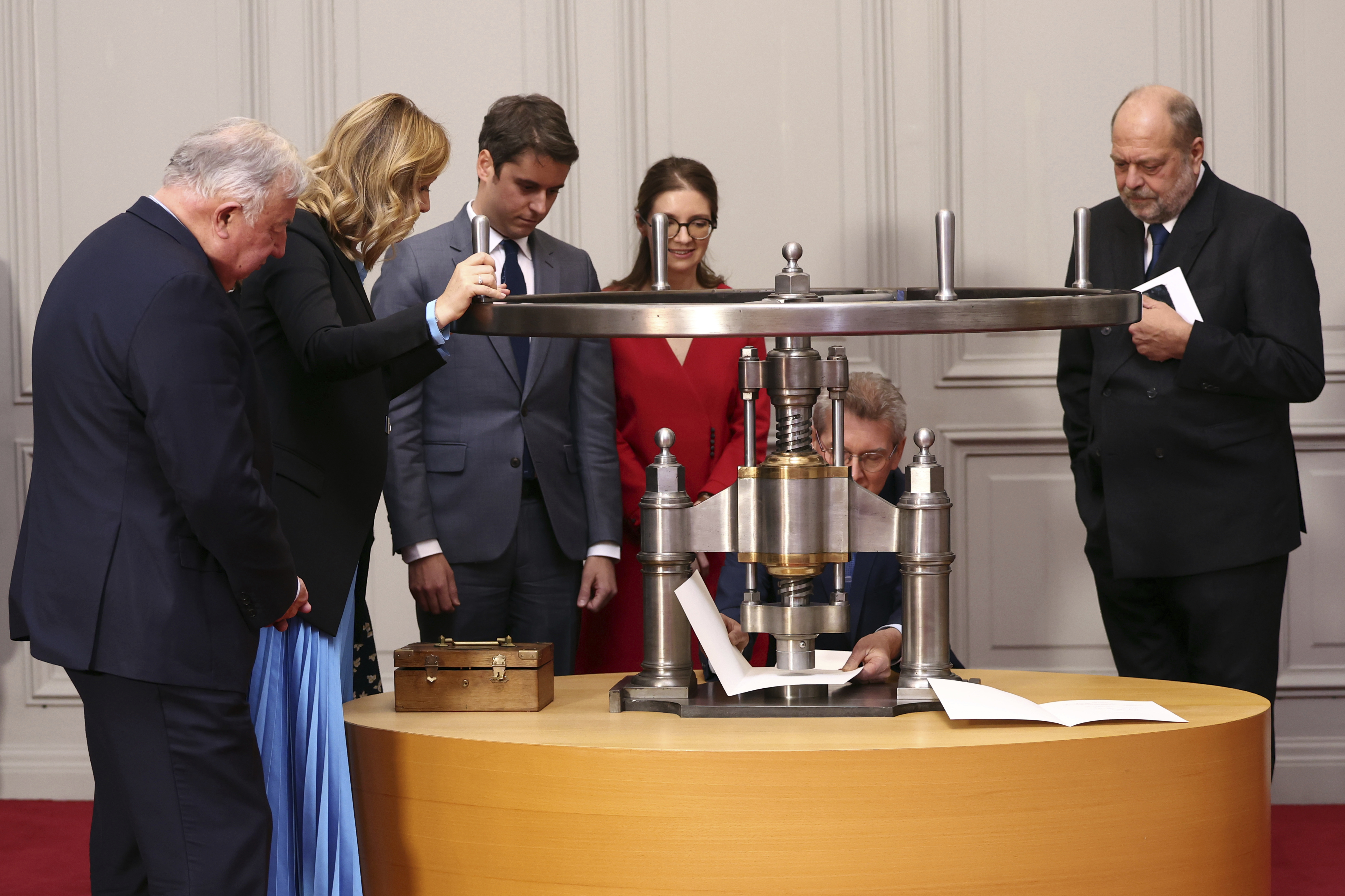 From left, France's Senate President Gerard Larcher, National Assembly President Yael Braun-Pivet, Prime Minister Gabriel Attal Deputy Minister for Gender Equality Aurore Berge, Justice Minister Eric Dupond-Moretti attend the "seal of the abortion right article 34 into the constitution at the Palace of Versailles, Monday, March 4, 2024 in Versailles, France, west of Paris. 