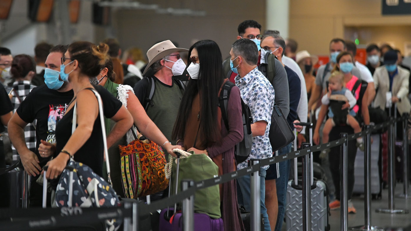 Passengers queue for departure at Sydney Domestic Airport in Sydney. 19th Dec 2020