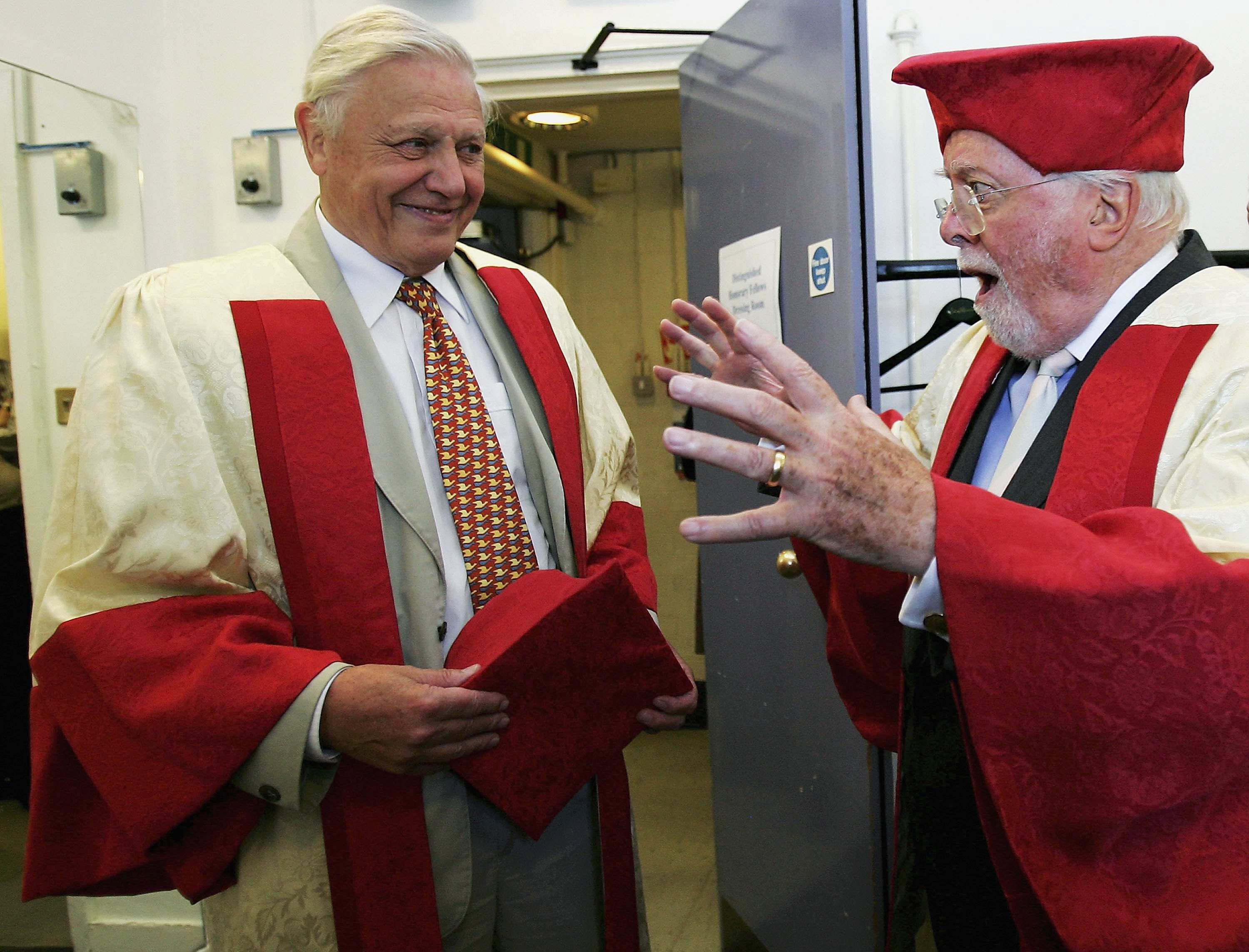 Lord Richard and Sir David Attenborough in their robes before being awarded the title of Distinguished Honorary Fellowships from the University of Leicester on July 13, 2006.