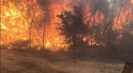 Residents in two Victorian communities have been told to leave as firefighters continue to fight a bushfire in the Grampians National Park.