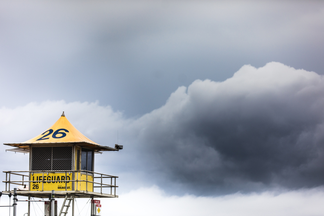 The Gold Coast has closed all beaches as a slow-moving trough sweeps across Queensland.
