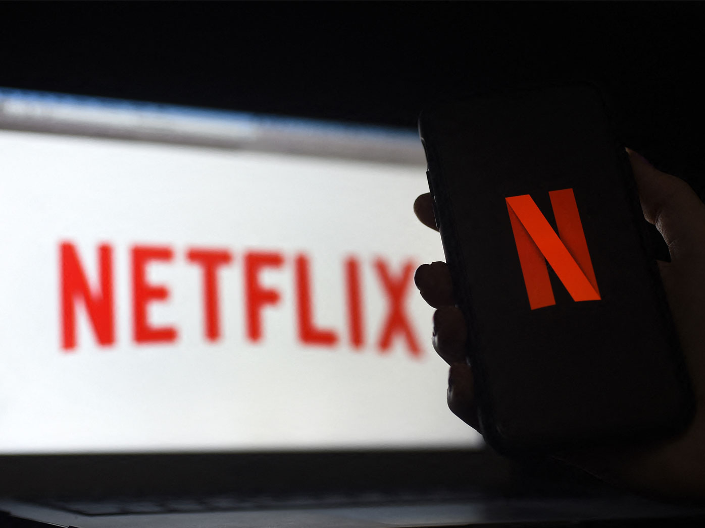 Netflix shed almost 1 million subscribers during the spring amid tougher competition and soaring inflation that's squeezing household budgets, heightening the urgency behind the video streaming service's effort to launch a cheaper option with commercial interruptions.