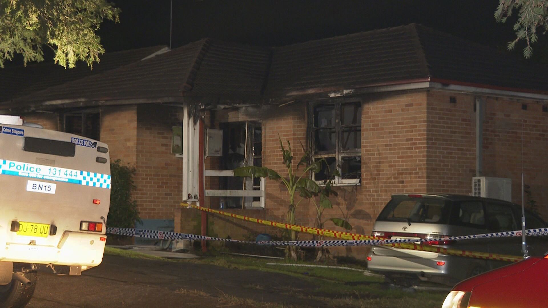 A﻿ man is custody after a house fire killed three children at Lalor Park