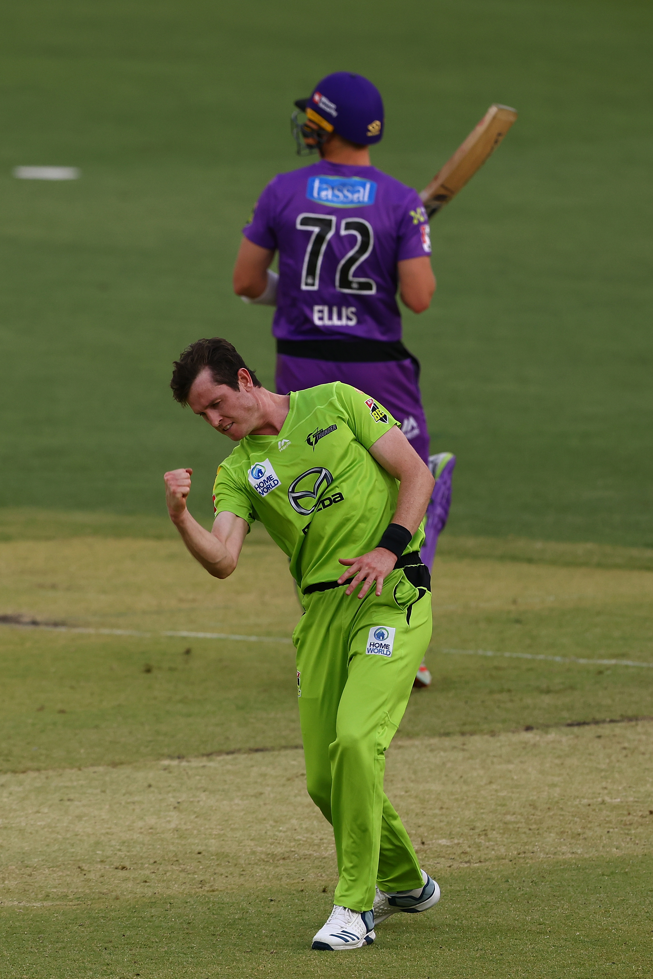 Adam Milne of the Thunder celebrates the wicket of Macalister Wright of the Hurricanes.