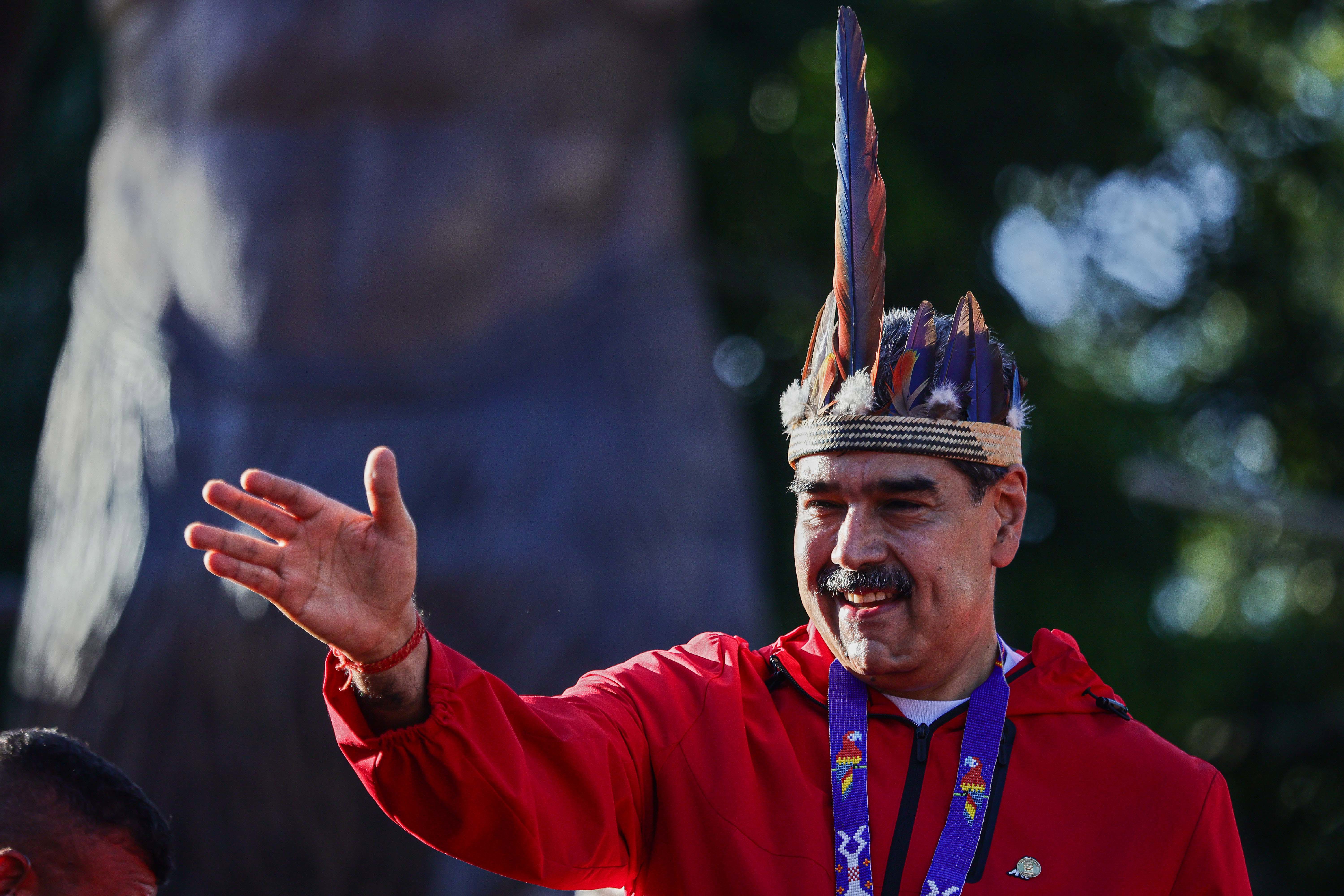 President Nicolás Maduro of Venezuela greets his supporters during a rally to commemorate Indigenous Resistance Day on October 12, 2025 in Caracas, Venezuela. 