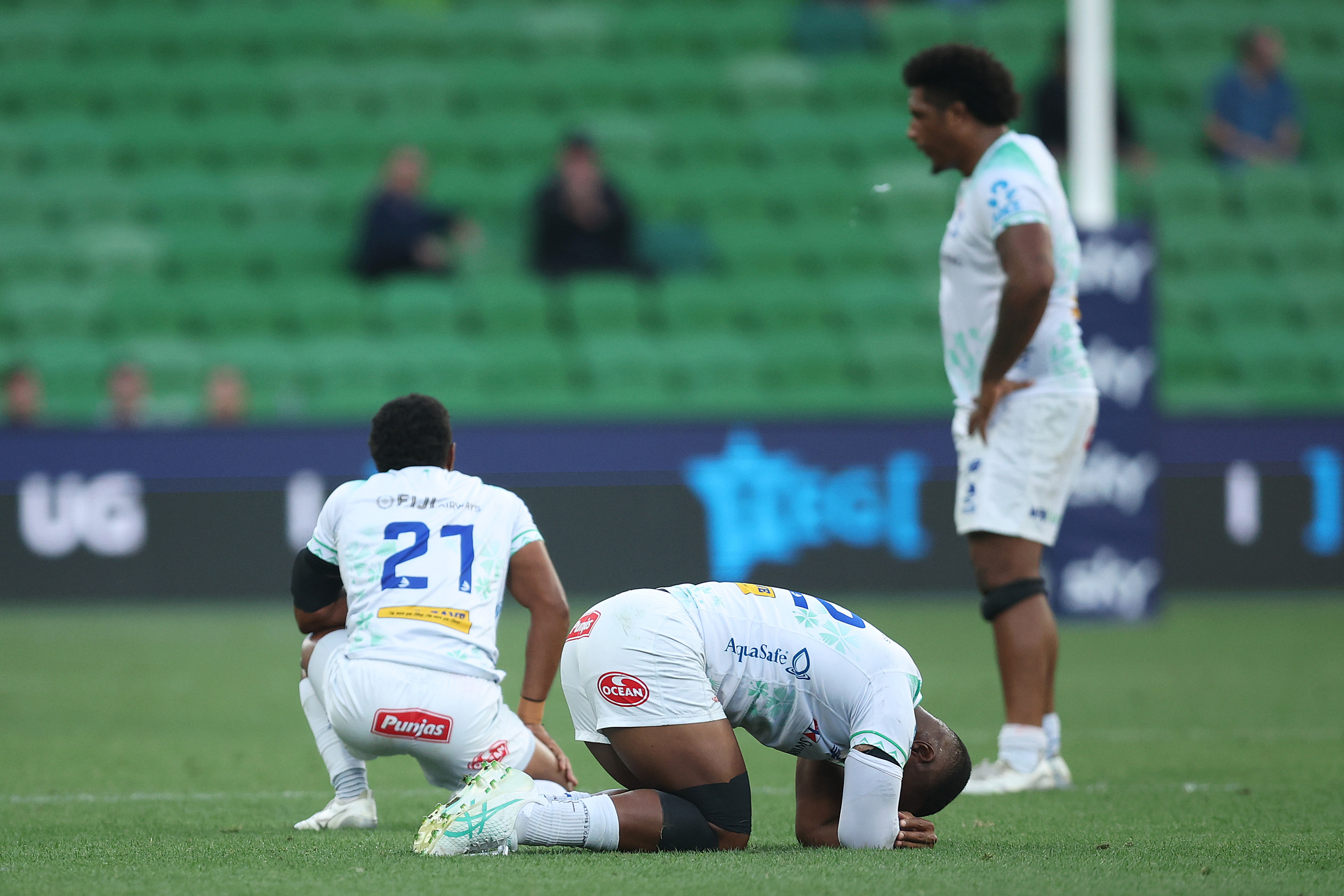 Fijian Drua players react after being defeated during the round two Super Rugby Pacific match agianst Moana Pasifika.