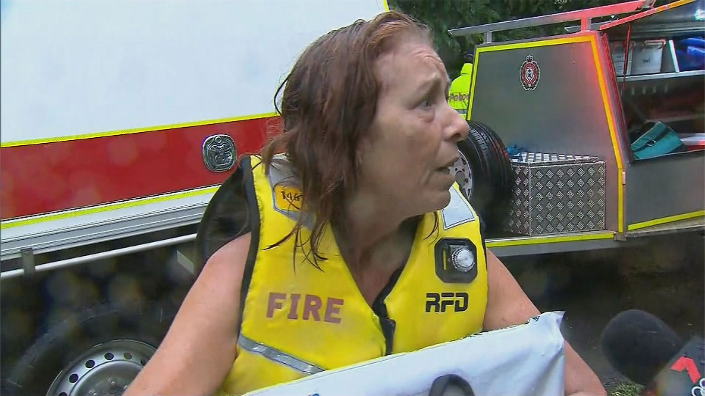 A couple have been rescued from rising floodwaters at the Sunshine Coast in QLD after they parked their car for a five hour pit-stop. 