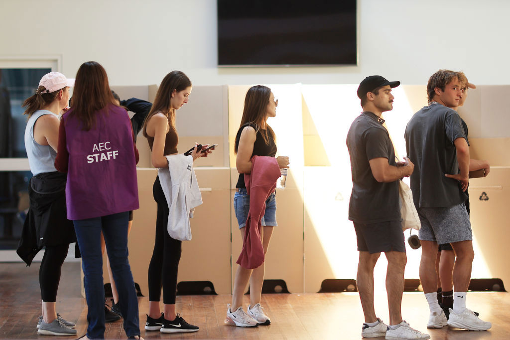 SYDNEY, AUSTRALIA - OCTOBER 14: SYDNEY, AUSTRALIA - OCTOBER 14: People line up to vote at Clovelly Surf Life Saving Club polling centre on October 14, 2023 in Sydney, Australia. A referendum for Australians to decide on an indigenous voice to parliament was held on October 14, 2023 and compelled all Australians to vote by law. Early voting began on Oct. 2, and activity has been intensifying in both the YES and NO camps, with multiple polls showing the YES campaign headed for defeat nationally. A