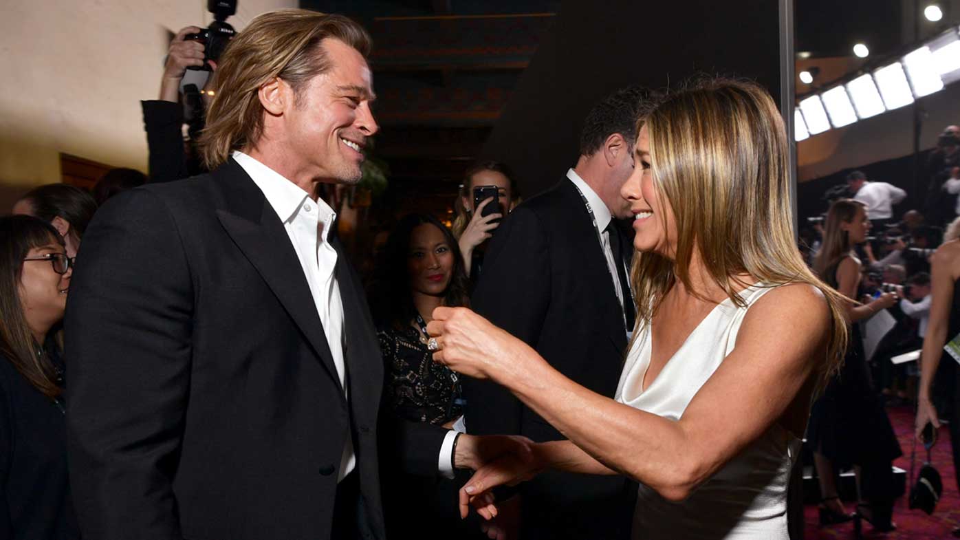 Brad Pitt and Jennifer Aniston cross paths on the SAG red carpet.